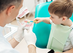 Young boy receiving dental exam