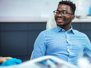 Dental patient relaxing in treatment chair