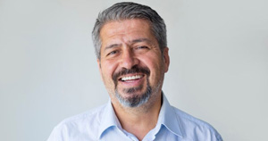 Headshot of mature, smiling man