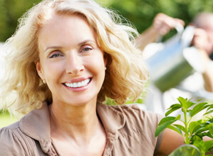 woman smiling in garden