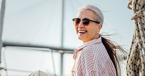Happy older woman enjoying time outdoors