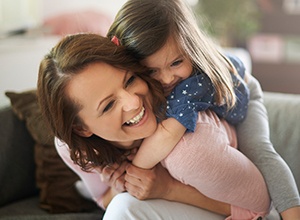 woman holding daughter