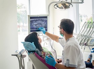 Dental patient considering root canal therapy vs. extraction
