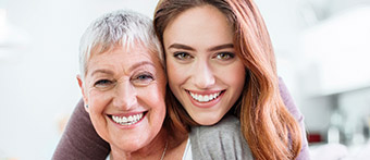 granddaughter and grandmother smiling
