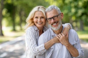 Smiling older couple with nice teeth