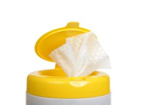 Canister containing disinfecting wipes for use in dental safety protocol